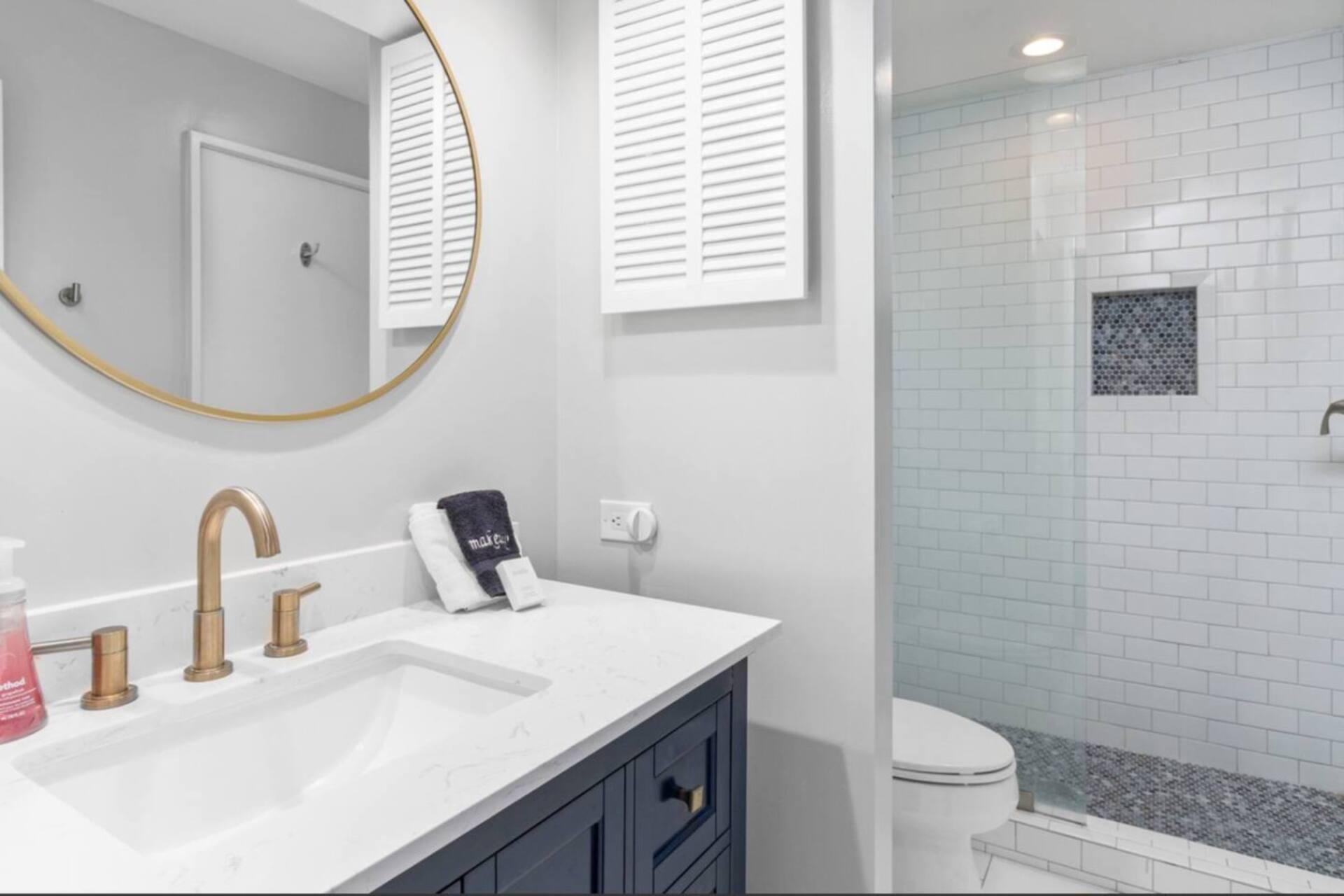 Guest bathroom with tub and shower